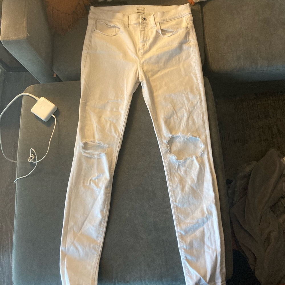 Sneak Peek NWOT White Ripped Mid Rise Jeans
